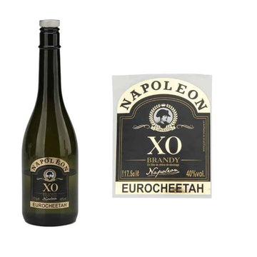 Hand applying a waterproof custom label onto a glass wine bottle smoothly